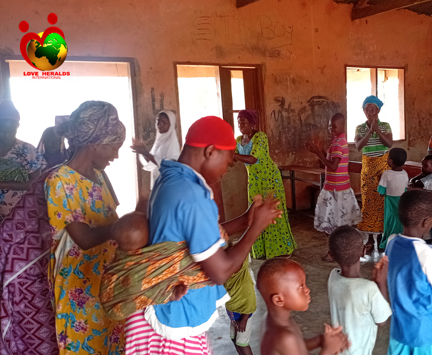 community members dancing in their newly built church