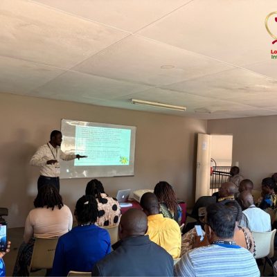 Dr. Daniel sharing in a workshop session